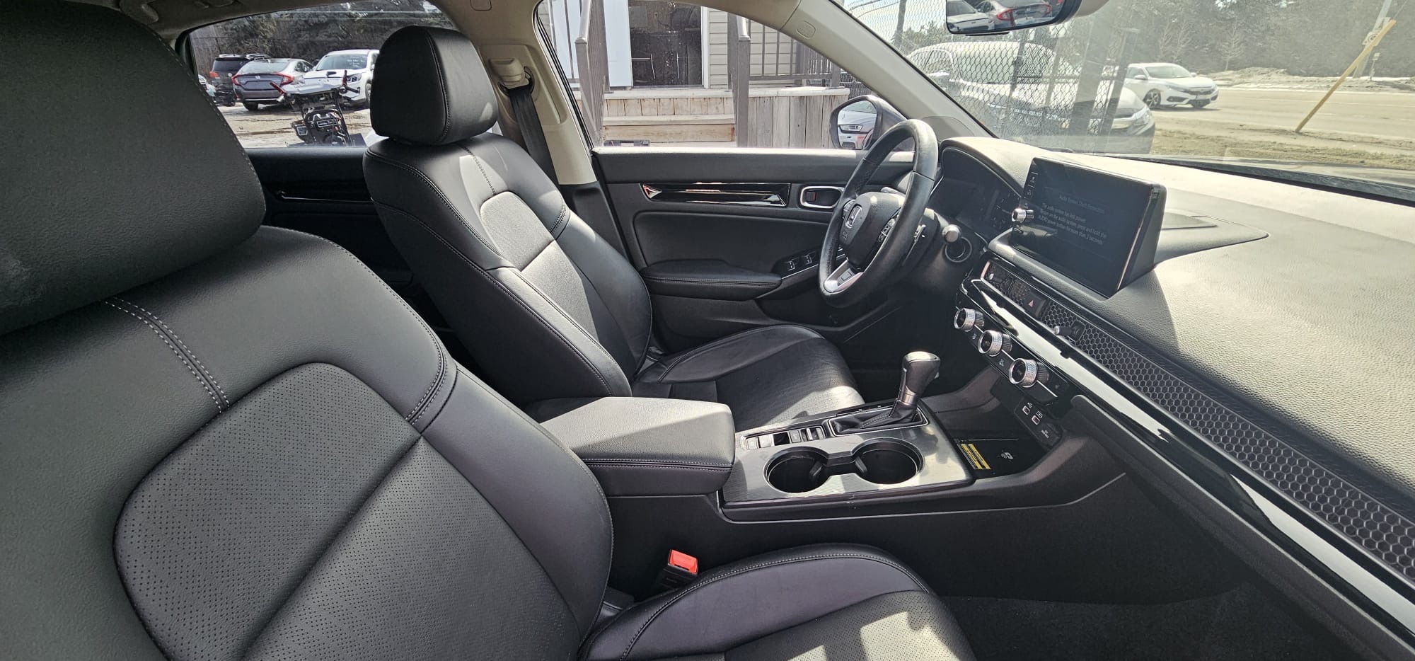 2022 Honda Civic Touring.                                                                        $13,200