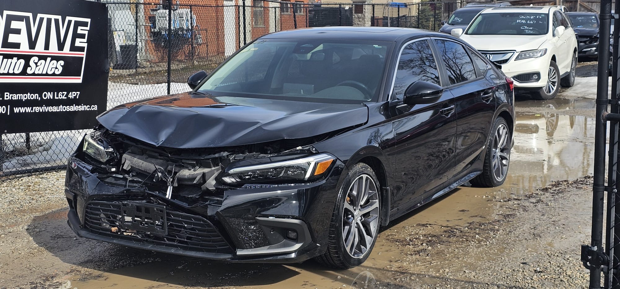 2022 Honda Civic Touring.                                                                        $13,200