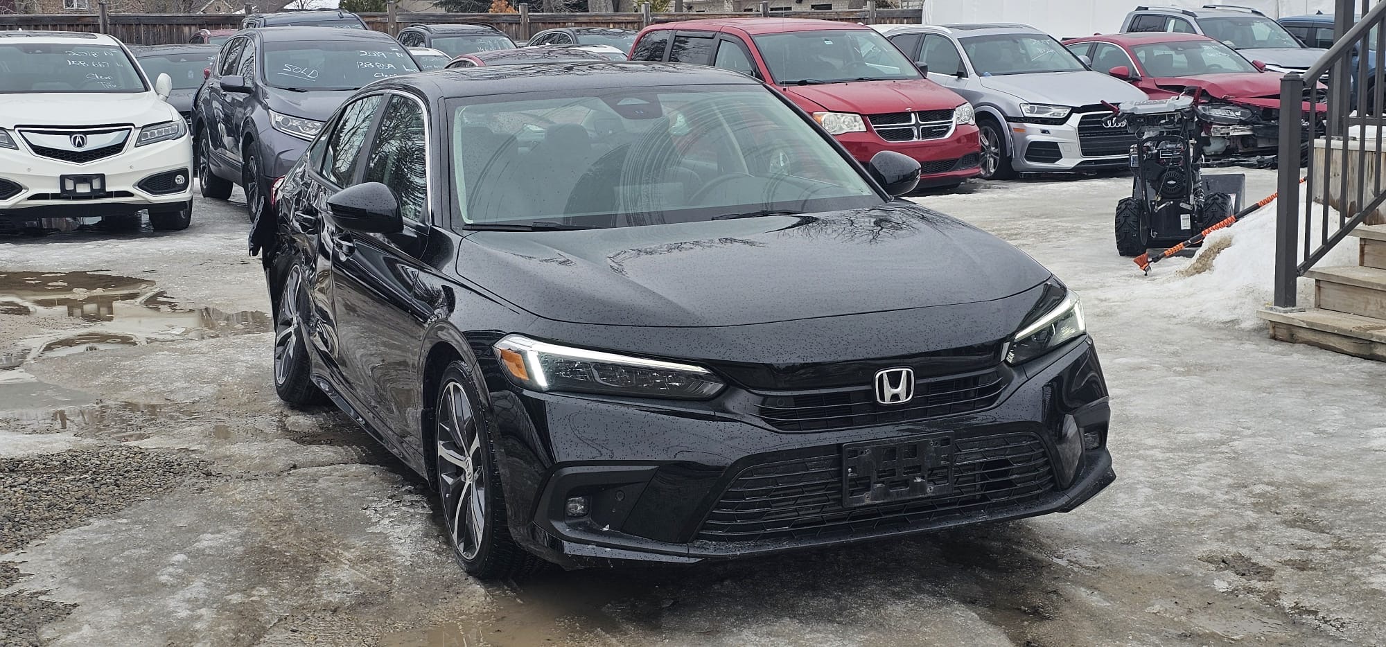 2022 Honda Civic Touring.                                                                        $13,900