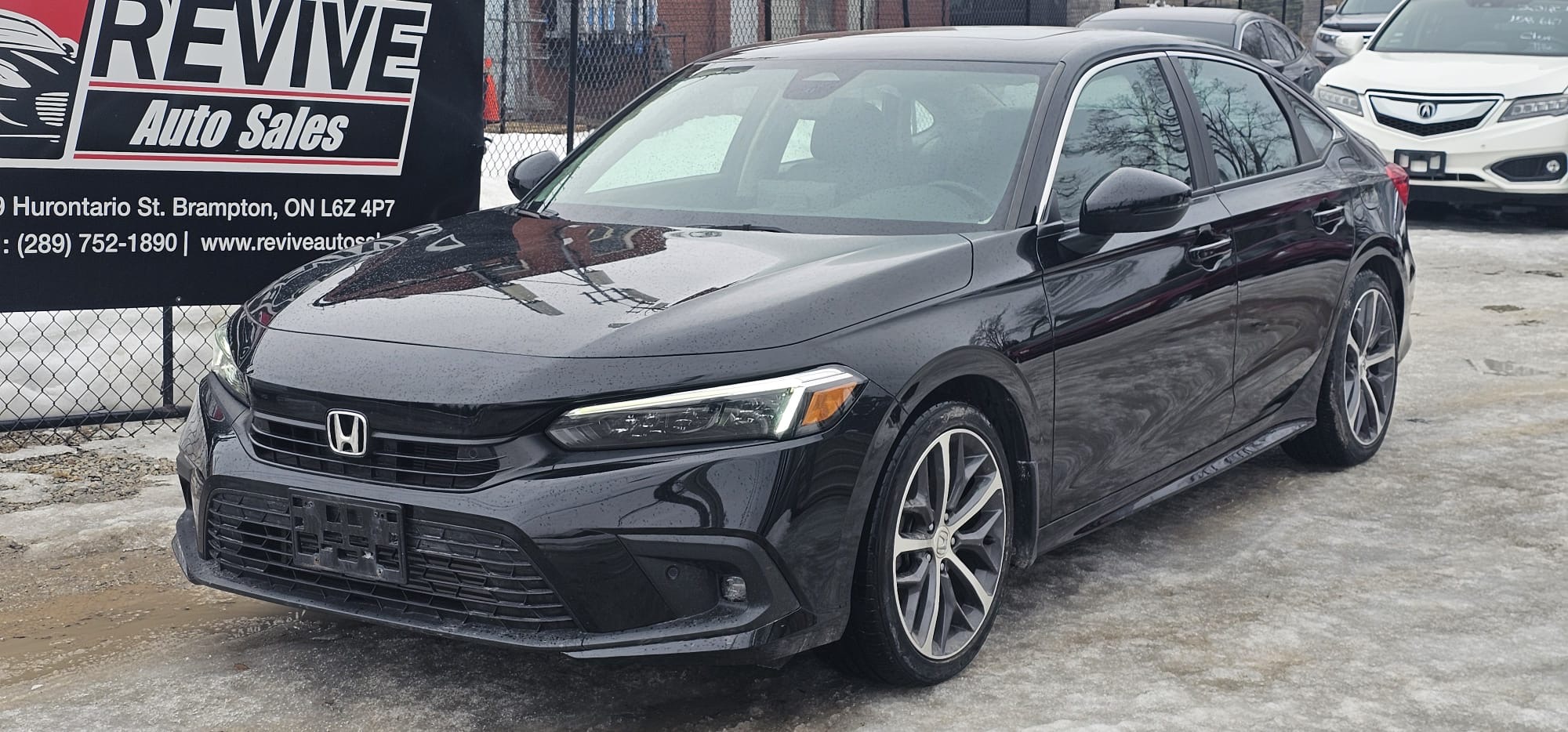 2022 Honda Civic Touring.                                                                        $13,900